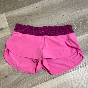 Pink running shorts
